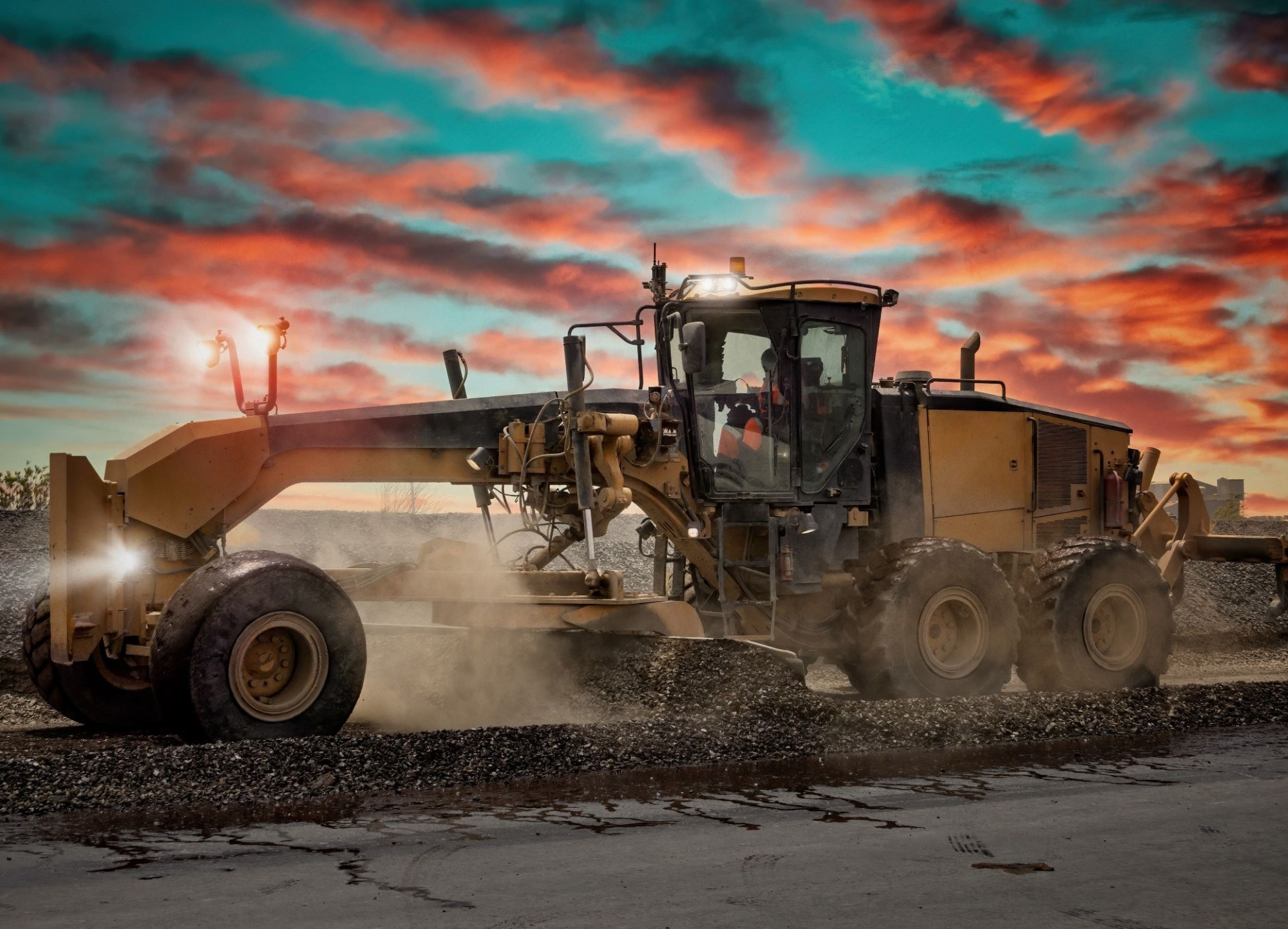 Heavy duty construction machinery building a road