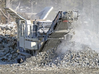 Heavy duty machinery crushing up concrete